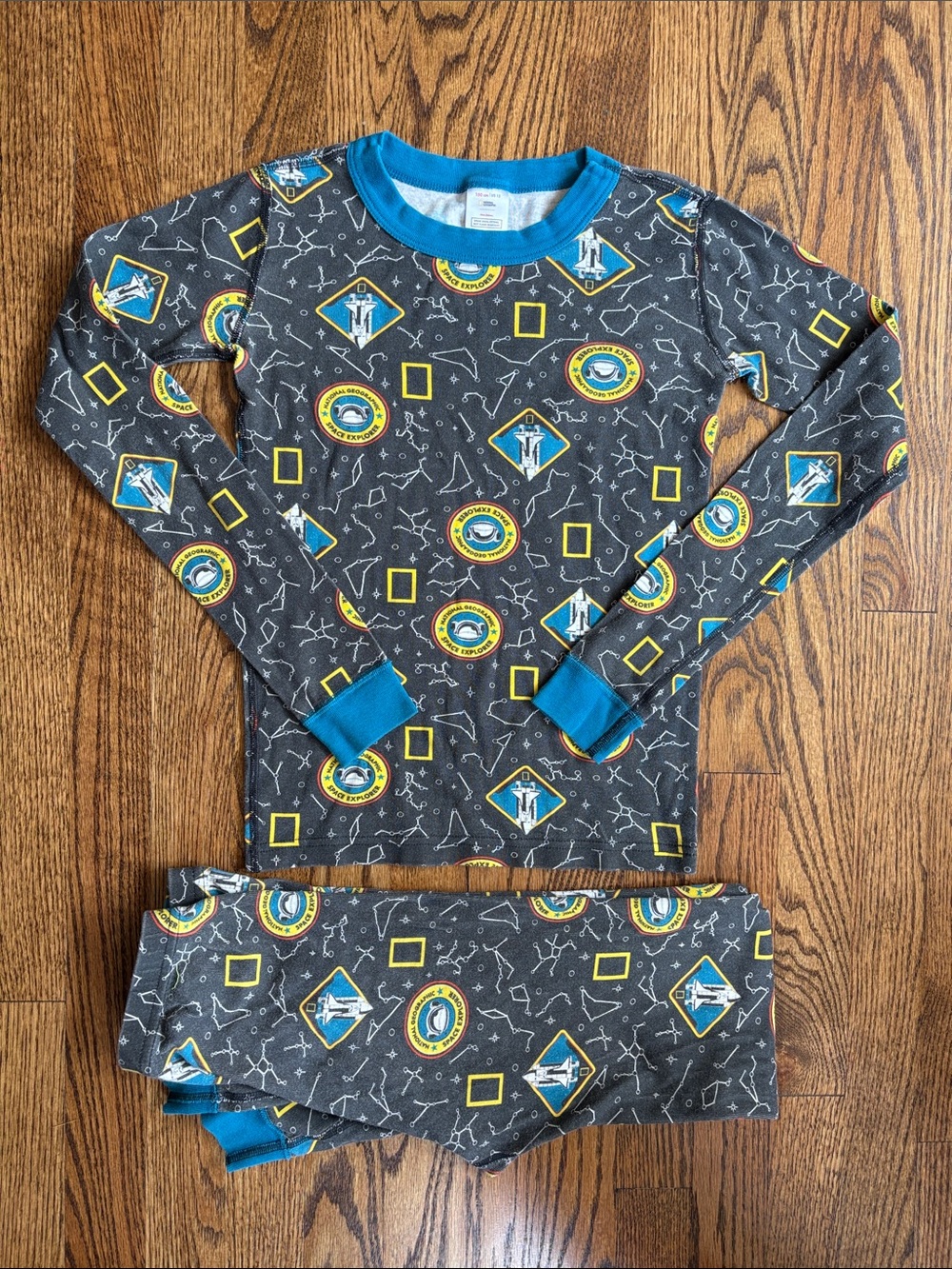 Hanna Andersson grey Space Legend print, 2 piece pajama set, size 12. Like new